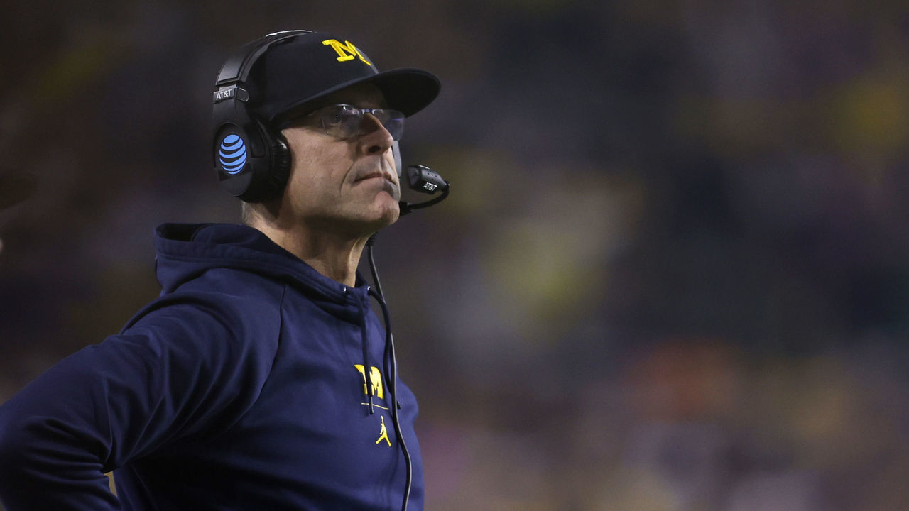 GLENDALE, ARIZONA - DECEMBER 31: Head coach Jim Harbaugh of the Michigan Wolverines looks on during the second half of the Vrbo Fiesta Bowl against the TCU Horned Frogs at State Farm Stadium on December 31, 2022 in Glendale, Arizona. The Horned Frogs defeated the Wolverines 51-45.