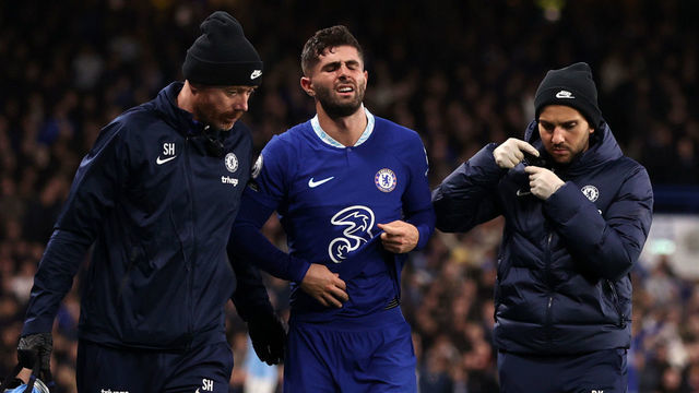 LONDON, ENGLAND - JANUARY 05: Christian Pulisic of Chelsea looks on after leaving the field following medical treatment, shortly before being replaced by substitute Carney Chukwuemeka ( not pictured ), during the Premier League match between Chelsea FC and Manchester City at Stamford Bridge on January 05, 2023 in London, England.