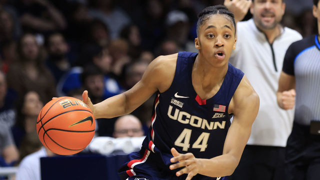 INDIANAPOLIS, INDIANA - JANUARY 03: Aubrey Griffin #44 of the UConn Huskies drives to the basket in the game against the Butler Bulldogs at Hinkle Fieldhouse on January 03, 2023 in Indianapolis, Indiana.