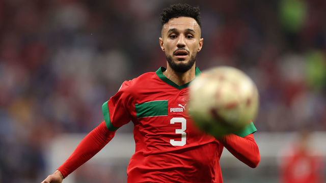 AL KHOR, QATAR - DECEMBER 14: Noussair Mazraoui of Morocco focuses on the ball during the FIFA World Cup Qatar 2022 semi final match between France and Morocco at Al Bayt Stadium on December 14, 2022 in Al Khor, Qatar.