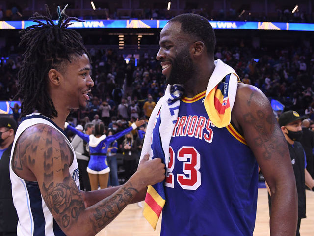 SAN FRANCISCO, CA - DECEMBER 23: Ja Morant #12 of the Memphis Grizzlies speaks with Draymond Green #23 of the Golden State Warriors after the game on December 23, 2021 at Chase Center in San Francisco, California. NOTE TO USER: User expressly acknowledges and agrees that, by downloading and or using this photograph, user is consenting to the terms and conditions of Getty Images License Agreement. Mandatory Copyright Notice: Copyright 2021 NBAE