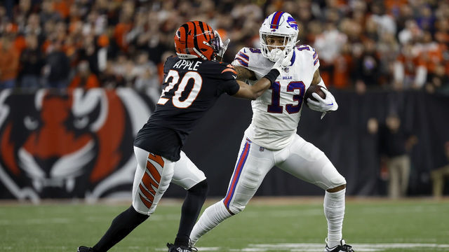 CINCINNATI, OH - JANUARY 02: Gabe Davis #13 of the Buffalo Bills attempts to run the ball past Eli Apple #20 of the Cincinnati Bengals during the game at Paycor Stadium on January 2, 2023 in Cincinnati, Ohio.