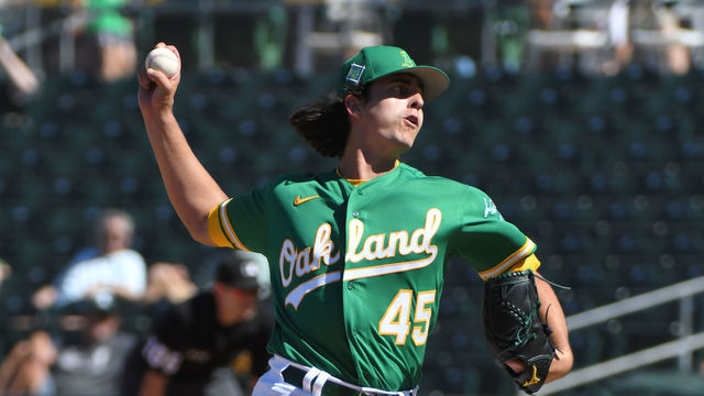 MESA, AZ - MARCH 24, 2022: Brent Honeywell #45 of the Oakland Athletics throws a pitch during the sixth inning of an MLB spring training game against the Texas Rangers at Hohokam Stadium on March 24, 2022 in Mesa, Arizona.