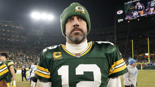GREEN BAY, WISCONSIN - JANUARY 08: Aaron Rodgers #12 and Randall Cobb #18 of the Green Bay Packers walk off the field after losing to the Detroit Lions at Lambeau Field on January 08, 2023 in Green Bay, Wisconsin.