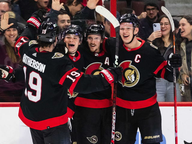 OTTAWA, ON - JANUARY 07: Ottawa Senators Center Tim Stutzle (18) celebrates his first goal with teammates Right Wing Drake Batherson (19), Defenceman Thomas Chabot (72) and Left Wing Brady Tkachuk (7) during second period National Hockey League action between the Seattle Kraken and Ottawa Senators on January 7, 2023, at Canadian Tire Centre in Ottawa, ON, Canada.