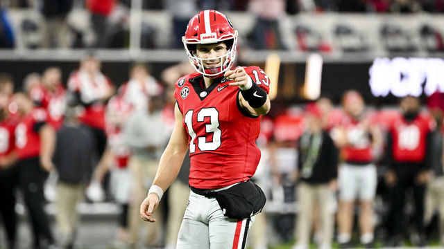 LOS ANGELES, CA - JANUARY 09: Georgia Bulldogs quarterback Stetson Bennett (13) celebrates after a touchdown pass during the second half the CFP National Championship game against the TCU Horned Frogs at SoFi Stadium on Monday, Jan. 9, 2023 in Los Angeles, CA.(Wally Skalij / Los Angeles Times via Getty Images)