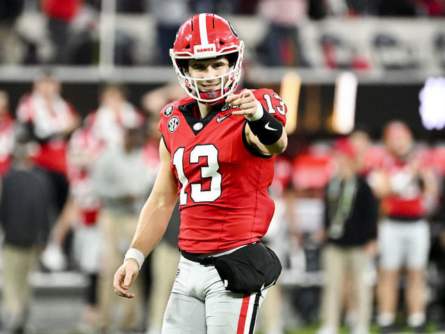 LOS ANGELES, CA - JANUARY 09: Georgia Bulldogs quarterback Stetson Bennett (13) celebrates after a touchdown pass during the second half the CFP National Championship game against the TCU Horned Frogs at SoFi Stadium on Monday, Jan. 9, 2023 in Los Angeles, CA.(Wally Skalij / Los Angeles Times via Getty Images)