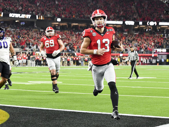 LOS ANGELES, CA - JANUARY 09: Georgia Bulldogs quarterback Stetson Bennett (13) runs in for his second touchdown during the first half the CFP National Championship game against the TCU Horned Frogs at SoFi Stadium on Monday, Jan. 9, 2023 in Los Angeles, CA.(Wally Skalij / Los Angeles Times via Getty Images)