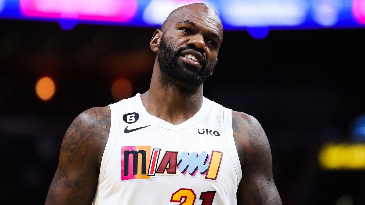 MIAMI, FLORIDA - DECEMBER 10: Dewayne Dedmon #21 of the Miami Heat looks on during the second half of the game nio Spurs at FTX Arena on December 10, 2022 in Miami, Florida.