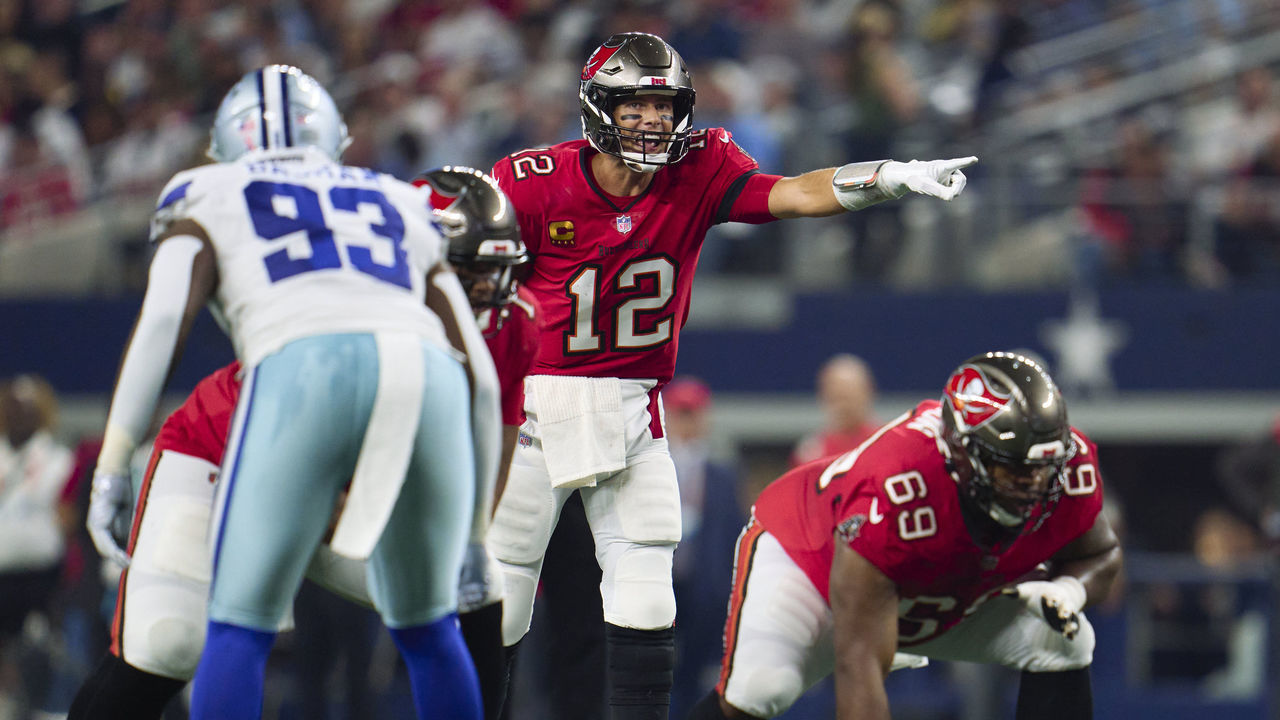 ARLINGTON, TX - SEPTEMBER 11: Tom Brady #12 of the Tampa Bay Buccaneers calls a play at the line of scrimmage against the Dallas Cowboys at AT&T Stadium on September 11, 2022 in Arlington, TX.