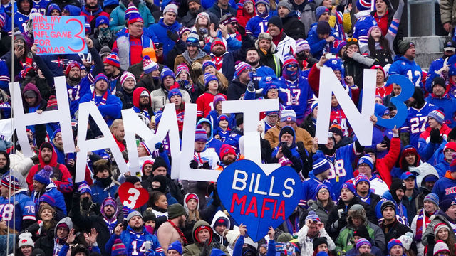 Orchard Park, NY - January 8: Buffalo Bills fans hold up signs in support of Damar Hamlin during their regular season finale against the New England Patriots.