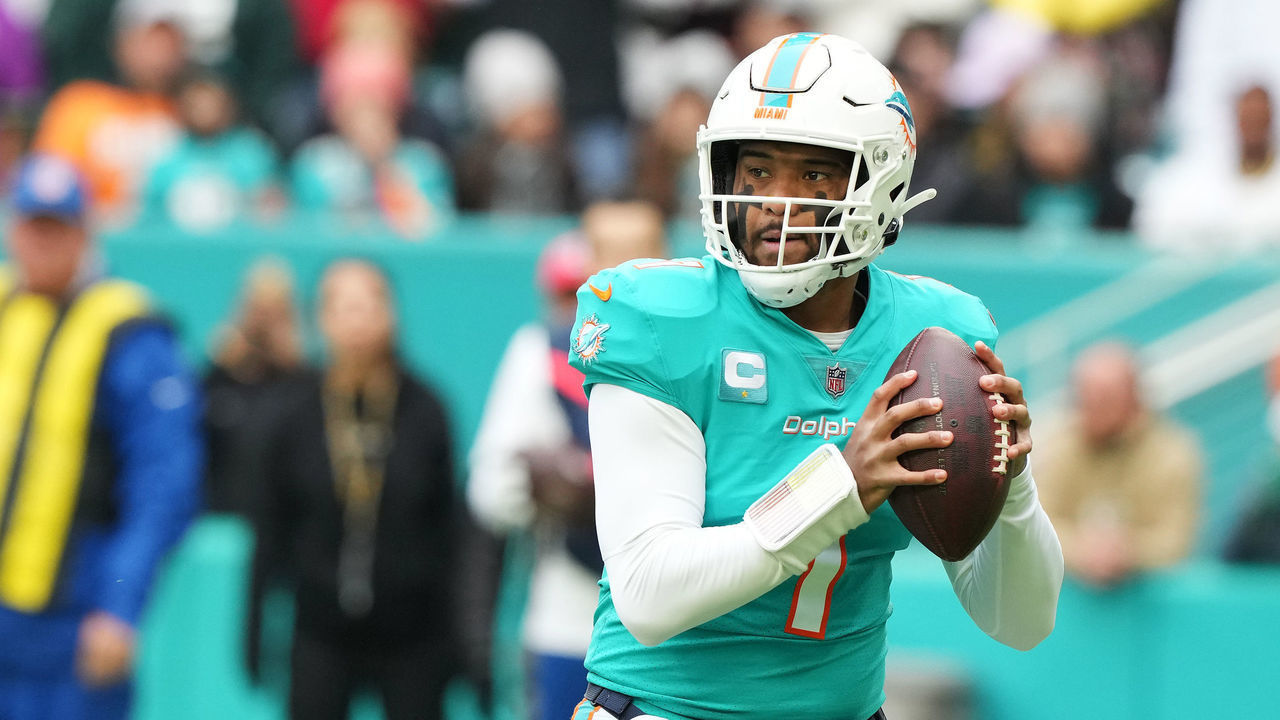 MIAMI GARDENS, FLORIDA - DECEMBER 25: Tua Tagovailoa #1 of the Miami Dolphins drops back to pass during the first quarter of the game against the Green Bay Packers at Hard Rock Stadium on December 25, 2022 in Miami Gardens, Florida.