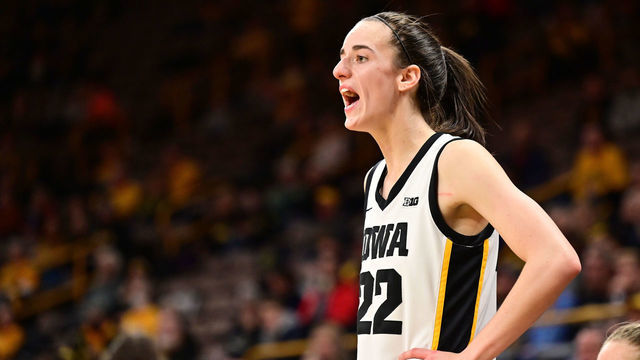 IOWA CITY, IA - DECEMBER 21: Iowa guard Caitlin Clark (22) cheers her teammates on during a women's college basketball game between the Dartmouth Big Green and the Iowa Hawkeyes on December 21, 2022, at Carver-Hawkeye Arena in Iowa City, IA.