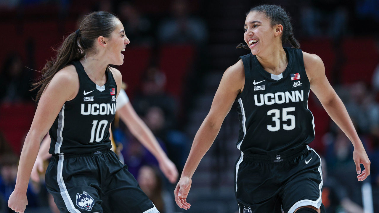 PORTLAND, OR - NOVEMBER 27: Nika Muhl #10 and Azzi Fudd #35 of the UConn Huskies celebrate during the game against the Iowa Hawkeyes at Moda Center on November 27, 2022 in Portland, Oregon.