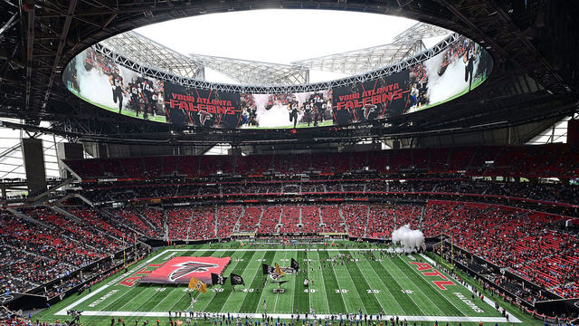 ATLANTA, GEORGIA - NOVEMBER 06: General view of the field during player introductions prior to the game between the Los Angles Chargers and the Atlanta Falcons at Mercedes-Benz Stadium on November 06, 2022 in Atlanta, Georgia.