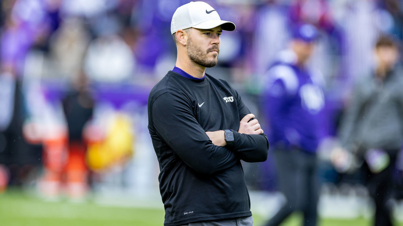 FORT WORTH, TX - NOVEMBER 26: TCU offensive coordinator Garrett Riley looks on during warmups during the college football game between the Iowa State Cyclones and TCU Horned Frogs on November 26, 2022 at Amon G. Carter Stadium in Fort Worth, TX.