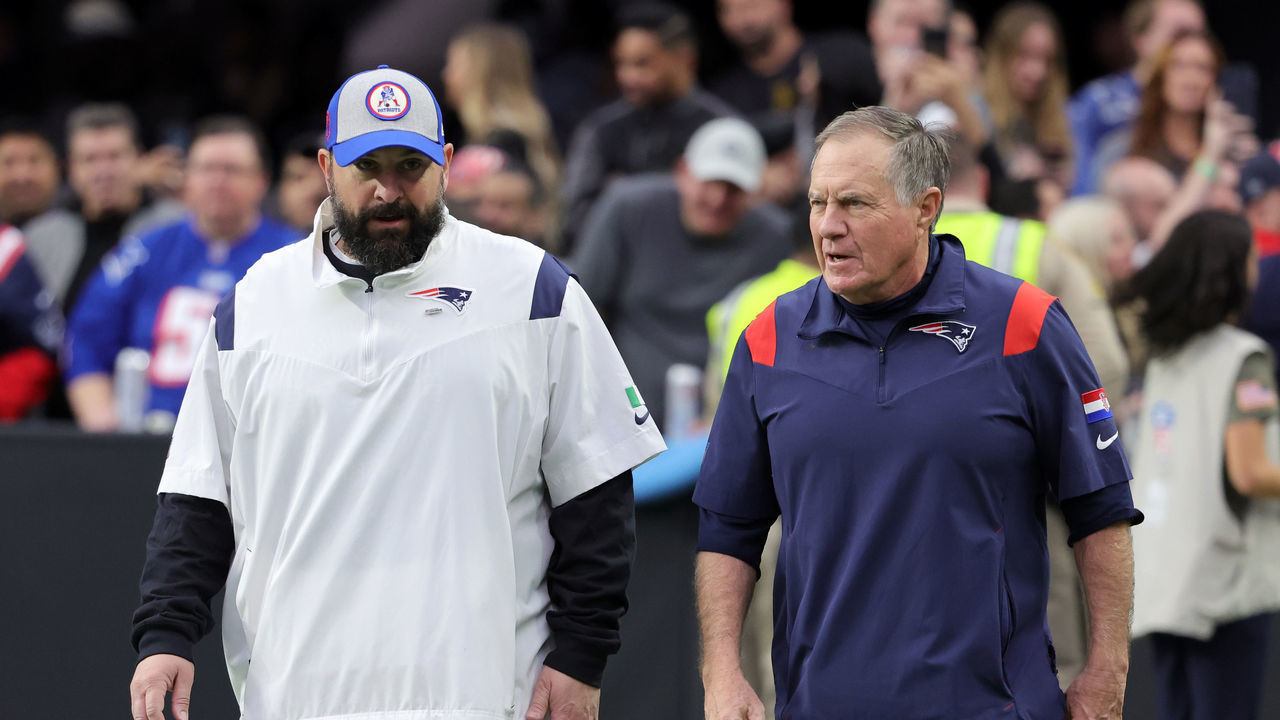 LAS VEGAS, NEVADA - DECEMBER 18: Senior football advisor and offensive line coach Matt Patricia (L) and head coach Bill Belichick of the New England Patriots walk onto the field for a game against the Las Vegas Raiders at Allegiant Stadium on December 18, 2022 in Las Vegas, Nevada. The Raiders defeated the Patriots 30-24.