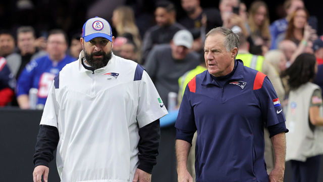 LAS VEGAS, NEVADA - DECEMBER 18: Senior football advisor and offensive line coach Matt Patricia (L) and head coach Bill Belichick of the New England Patriots walk onto the field for a game against the Las Vegas Raiders at Allegiant Stadium on December 18, 2022 in Las Vegas, Nevada. The Raiders defeated the Patriots 30-24.