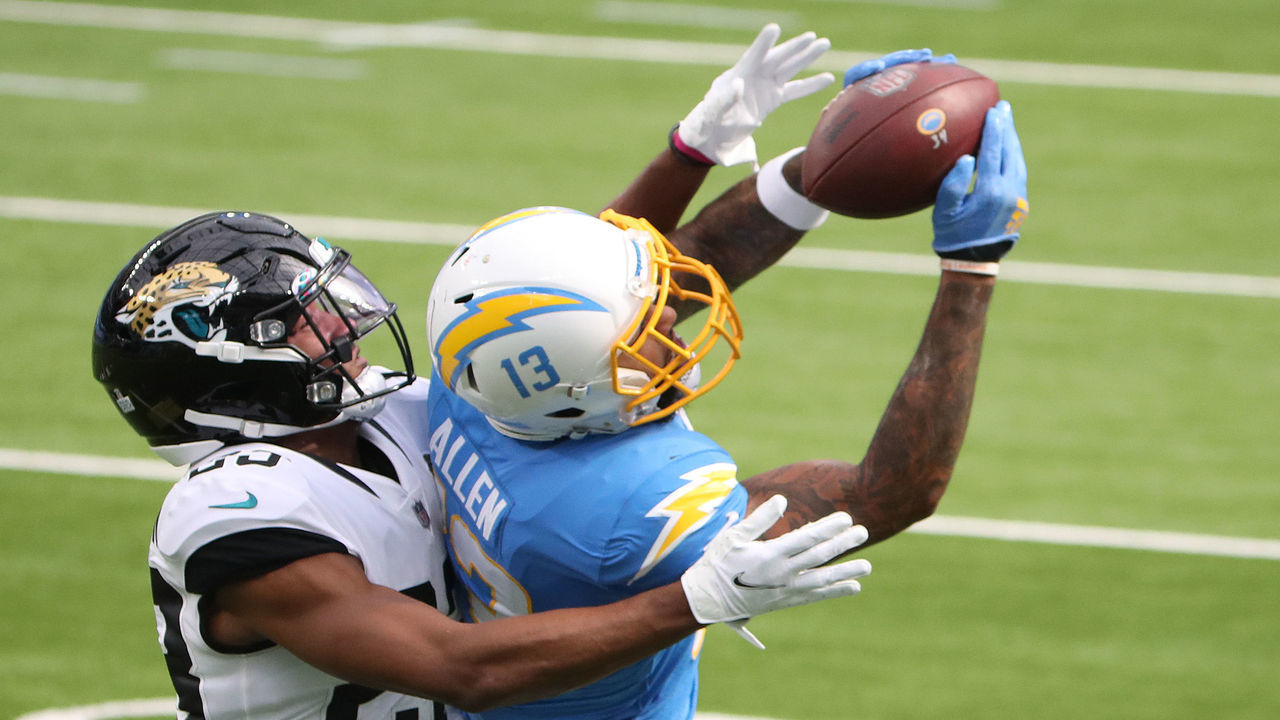INGLEWOOD, CALIFORNIA - OCTOBER 25: Keenan Allen #13 of the Los Angeles Chargers makes a catch against CJ Henderson #23 of the Jacksonville Jaguars during the first quarter at SoFi Stadium on October 25, 2020 in Inglewood, California.