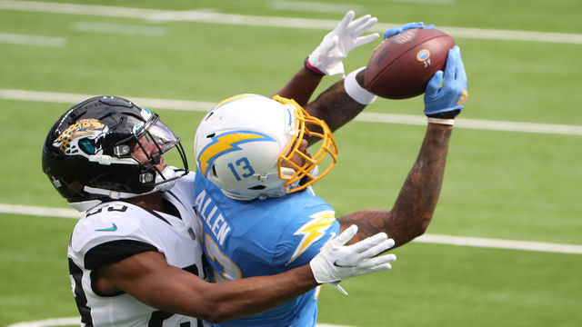 INGLEWOOD, CALIFORNIA - OCTOBER 25: Keenan Allen #13 of the Los Angeles Chargers makes a catch against CJ Henderson #23 of the Jacksonville Jaguars during the first quarter at SoFi Stadium on October 25, 2020 in Inglewood, California.
