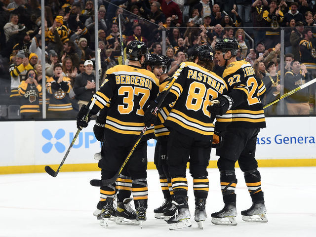 BOSTON, MASSACHUSETTS - DECEMBER 22: The Boston Bruins celebrate their second period goal against the Winnipeg Jets at the TD Garden on December 22, 2022 in Boston, Massachusetts.