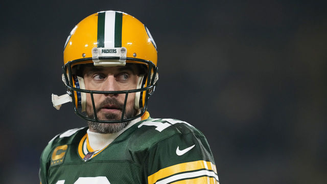 GREEN BAY, WISCONSIN - JANUARY 08: Aaron Rodgers #12 of the Green Bay Packers warms up before a game against the Detroit Lions at Lambeau Field on January 08, 2023 in Green Bay, Wisconsin.