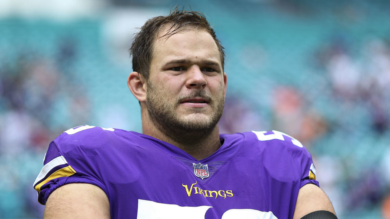 MIAMI GARDENS, FL - OCTOBER 16: Garrett Bradbury #56 of the Minnesota Vikings stretches prior to an NFL football game against the Miami Dolphins at Hard Rock Stadium on October 16, 2022 in Miami Gardens, Florida.