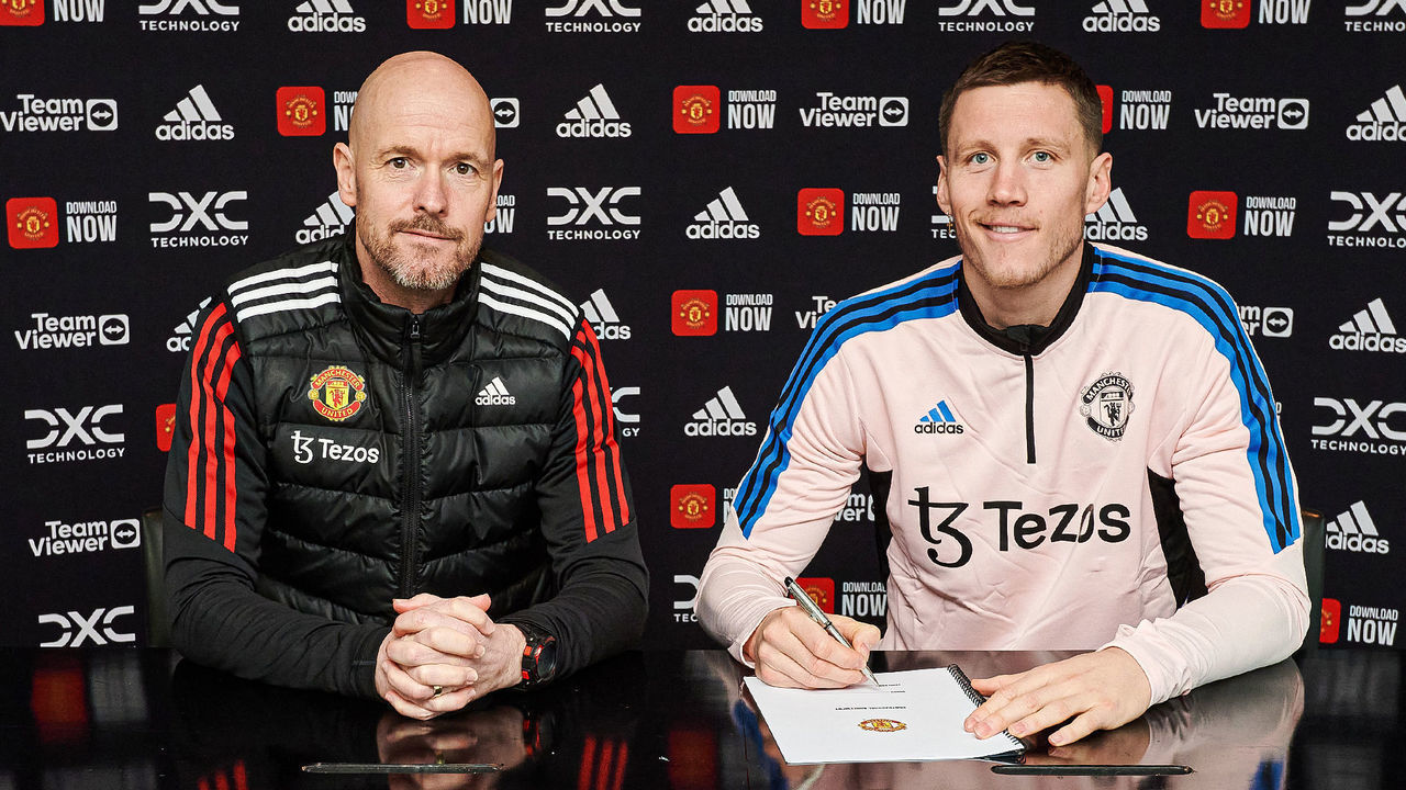 MANCHESTER, ENGLAND - JANUARY 13: (EXCLUSIVE COVERAGE) Wout Weghorst of Manchester United poses with Manager Erik ten Hag after signing on loan for the club at Carrington Training Ground on January 13, 2023 in Manchester, England.