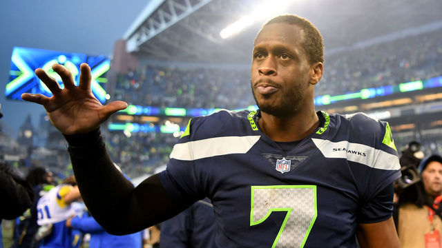 SEATTLE, WASHINGTON - JANUARY 08: Geno Smith #7 of the Seattle Seahawks celebrates after defeating the Los Angeles Rams in overtime at Lumen Field on January 08, 2023 in Seattle, Washington.