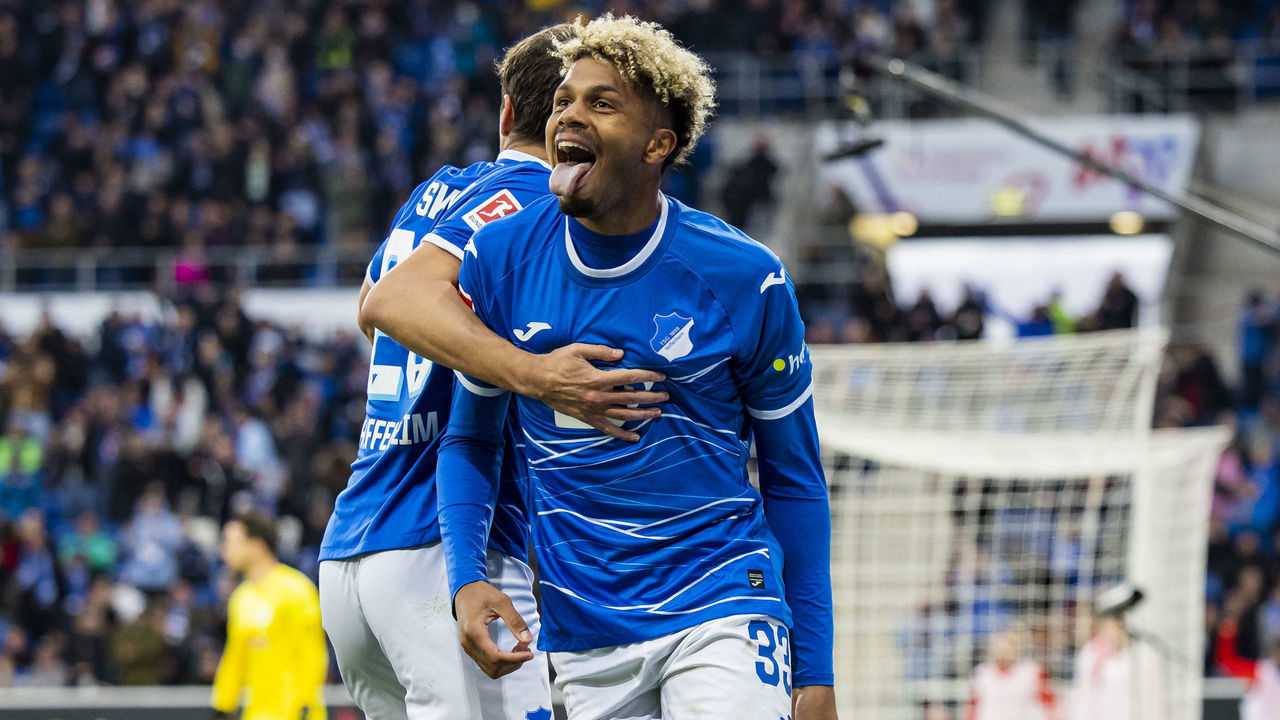 05 November 2022, Baden-Wuerttemberg, Sinsheim: Soccer: Bundesliga, TSG 1899 Hoffenheim - RB Leipzig, Matchday 13, PreZero Arena. Hoffenheim's Georginio Rutter (r) celebrates after his goal to make it 1:1. Photo: Tom Weller/dpa - IMPORTANT NOTE: In accordance with the requirements of the DFL Deutsche Fußball Liga and the DFB Deutscher Fußball-Bund, it is prohibited to use or have used photographs taken in the stadium and/or of the match in the form of sequence pictures and/or video-like photo series.