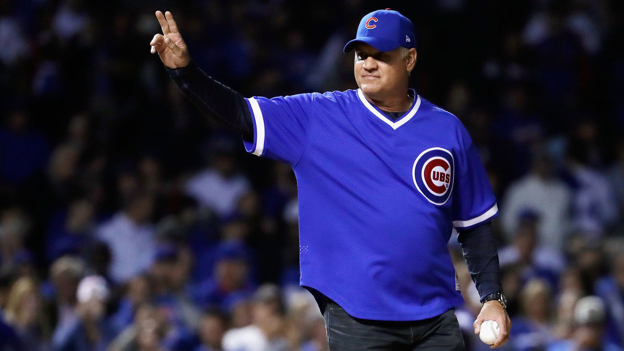 CHICAGO, IL - OCTOBER 18: Former Chicago Cubs player Ryne Sandberg waves to the crowd before throwing out a ceremonial first pitch before game four of the National League Championship Series between the Los Angeles Dodgers and the Chicago Cubs at Wrigley Field on October 18, 2017 in Chicago, Illinois.