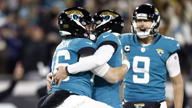 JACKSONVILLE, FLORIDA - JANUARY 14: Riley Patterson #10 of the Jacksonville Jaguars celebrates with teammates after kicking a field goal to defeat the Los Angeles Chargers 31-30 in the AFC Wild Card playoff game at TIAA Bank Field on January 14, 2023 in Jacksonville, Florida.