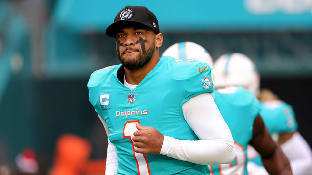 MIAMI GARDENS, FLORIDA - DECEMBER 25: Tua Tagovailoa #1 of the Miami Dolphins takes the field prior to a game against the Green Bay Packers at Hard Rock Stadium on December 25, 2022 in Miami Gardens, Florida.