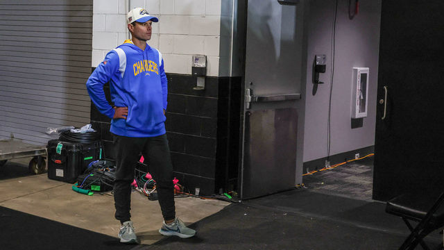 Jacksonville, Florida, January 14, 2023 - Head coach Brandon Staley stands washes in stunned silence outside the locker room, waiting for all his players to leave the field after losing 32-30 to the Jacksonville Jaguars in an AFC Wild Card game at TIAA Bank Field. (Robert Gauthier/Los Angeles Times via Getty Images)