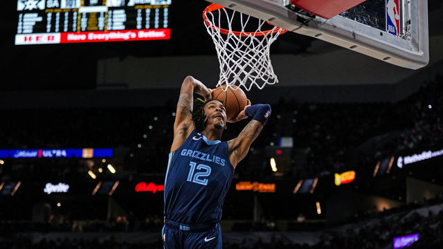SAN ANTONIO, TX - NOVEMBER 9: Ja Morant #12 of the Memphis Grizzlies dunks the ball against the San Antonio Spurs on November 9, 2022 at the AT&T Center in San Antonio, Texas. Mandatory Copyright Notice: Copyright 2022 NBAE (Photos by Cooper Neill/NBAE via Getty Images)