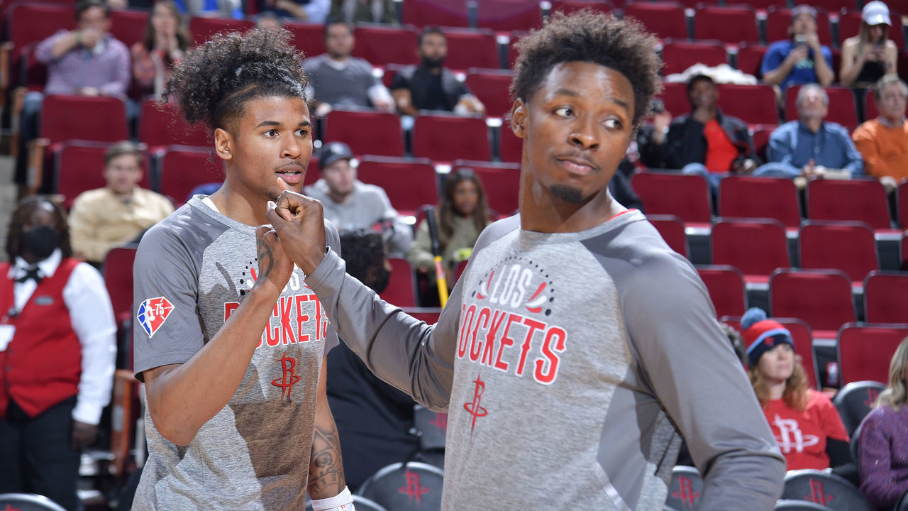 HOUSTON, TX - MARCH 2: Jalen Green #0 of the Houston Rockets high fives Jae'Sean Tate #8 of the Houston Rockets prior to the game against the Utah Jazz on March 2, 2022 at the Toyota Center in Houston, Texas. Mandatory Copyright Notice: Copyright 2022 NBAE