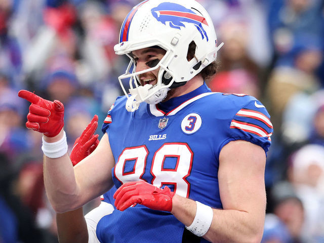 ORCHARD PARK, NEW YORK - JANUARY 08: Dawson Knox #88 of the Buffalo Bills celebrates after a receiving touchdown during the second quarter against the New York Jets at Highmark Stadium on January 08, 2023 in Orchard Park, New York.