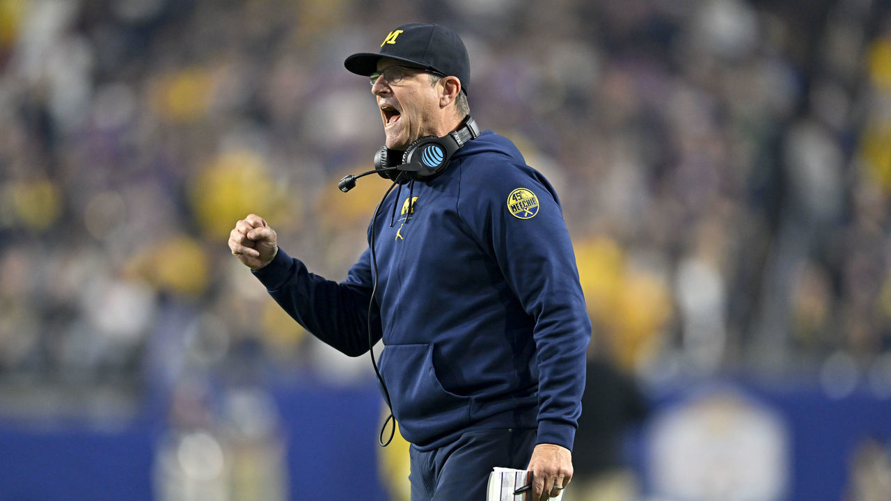 GLENDALE, ARIZONA - DECEMBER 31: Head coach Jim Harbaugh of the Michigan Wolverines gestures during the third quarter of the College Football Playoff Semifinal Fiesta Bowl football game against the TCU Horned Frogs at State Farm Stadium on December 31, 2022 in Glendale, Arizona. The TCU Horned Frogs won 51-45.
