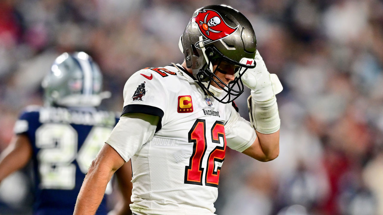 TAMPA, FLORIDA - JANUARY 16: Tom Brady #12 of the Tampa Bay Buccaneers reacts after a sack against the Dallas Cowboys during the fourth quarter in the NFC Wild Card playoff game at Raymond James Stadium on January 16, 2023 in Tampa, Florida.