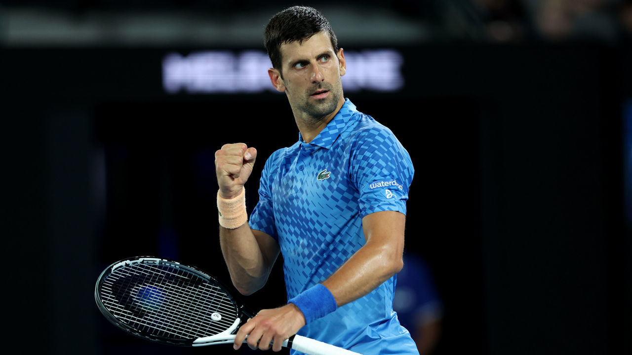 MELBOURNE, AUSTRALIA - JANUARY 17: Novak Djokovic of Serbia celebrates a poin in their round one singles match against Roberto Carballes Baena of Spain during day two of the 2023 Australian Open at Melbourne Park on January 17, 2023 in Melbourne, Australia.