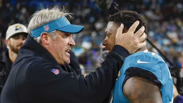 JACKSONVILLE, FL - JANUARY 14: Jacksonville Jaguars head coach Doug Pederson and Jacksonville Jaguars linebacker Josh Allen (41) celebrate after the game between the Los Angeles Chargers and the Jacksonville Jaguars on January 14, 2023 at TIAA Bank Field in Jacksonville, Fl.