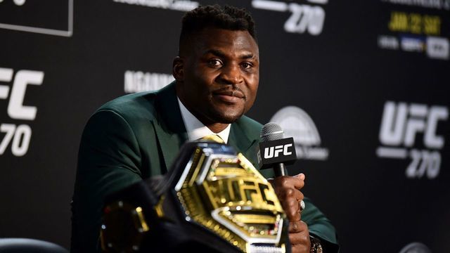 Champion Cameroon's Francis Ngannou takes questions in the press room after defeating French Cyril Gane in their UFC 270 championship fight in Anaheim on January 22, 2022.