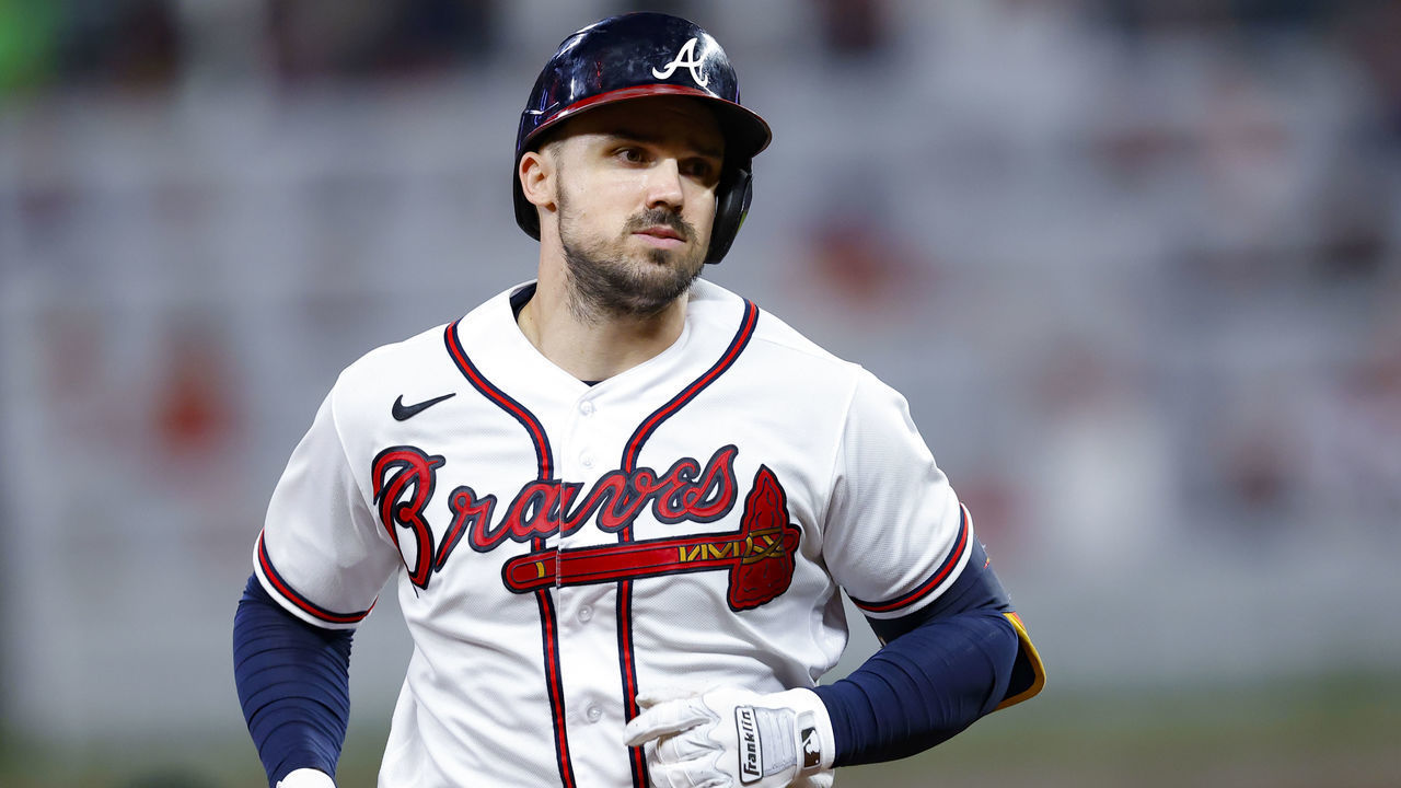 ATLANTA, GA - JULY 12: Adam Duvall #14 of the Atlanta Braves approaches third base after hitting a two run home run during the seventh inning against the New York Mets at Truist Park on July 12, 2022 in Atlanta, Georgia.