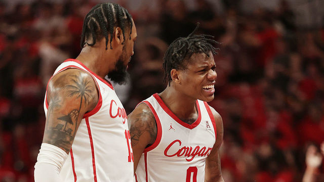 HOUSTON, TEXAS - JANUARY 11: Marcus Sasser #0 of the Houston Cougars reacts after being fouled after making a three point basket against the South Florida Bulls at Fertitta Center on January 11, 2023 in Houston, Texas.