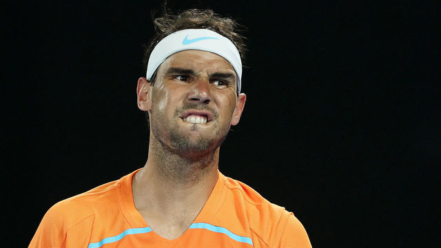 MELBOURNE, AUSTRALIA - JANUARY 18: Rafael Nadal of Spain reacts in their round two singles match against Mackenzie McDonald of the United States during day three of the 2023 Australian Open at Melbourne Park on January 18, 2023 in Melbourne, Australia.
