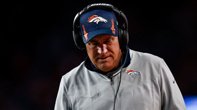 DENVER, CO - DECEMBER 19: Denver Broncos head coach Vic Fangio walks along the sideline during a game between the Denver Broncos and the Cincinnati Bengals at Empower Field at Mile High on December 19, 2021 in Denver, Colorado.