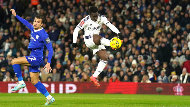Leeds United's Wilfried Gnonto (right) scores their side's first goal of the game during the Emirates FA Cup third round replay match at Elland Road, Leeds. Picture date: Wednesday January 18, 2023.