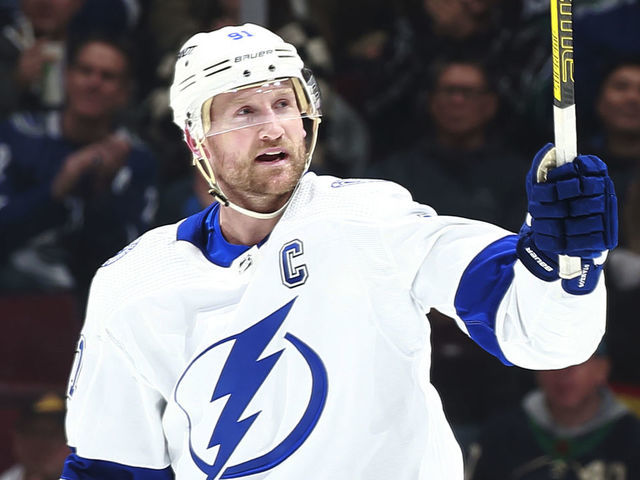 VANCOUVER, CANADA - JANUARY 18: Steven Stamkos #91 of the Tampa Bay Lightning raises his stick after his goal during the first period of their NHL game against the Vancouver Canucks at Rogers Arena January 18, 2023 in Vancouver, British Columbia, Canada.