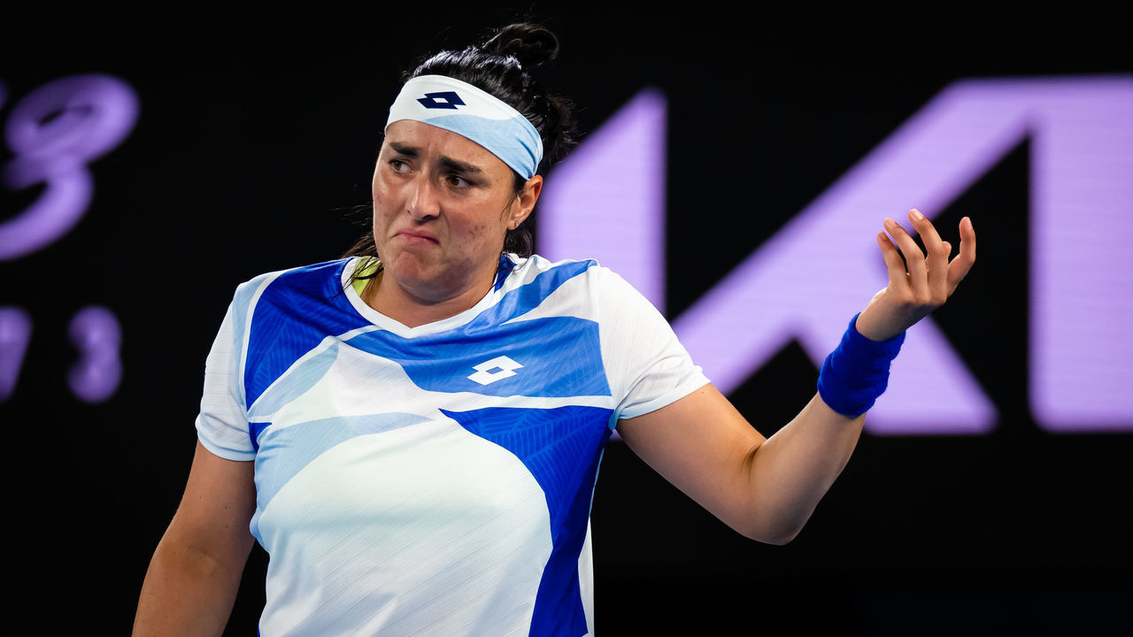 MELBOURNE, AUSTRALIA - JANUARY 19: Ons Jabeur of Tunisia in action against Marketa Vondrousova of the Czech Republic in her second round match on Day 4 of the 2023 Australian Open at Melbourne Park on January 19, 2023 in Melbourne, Australia