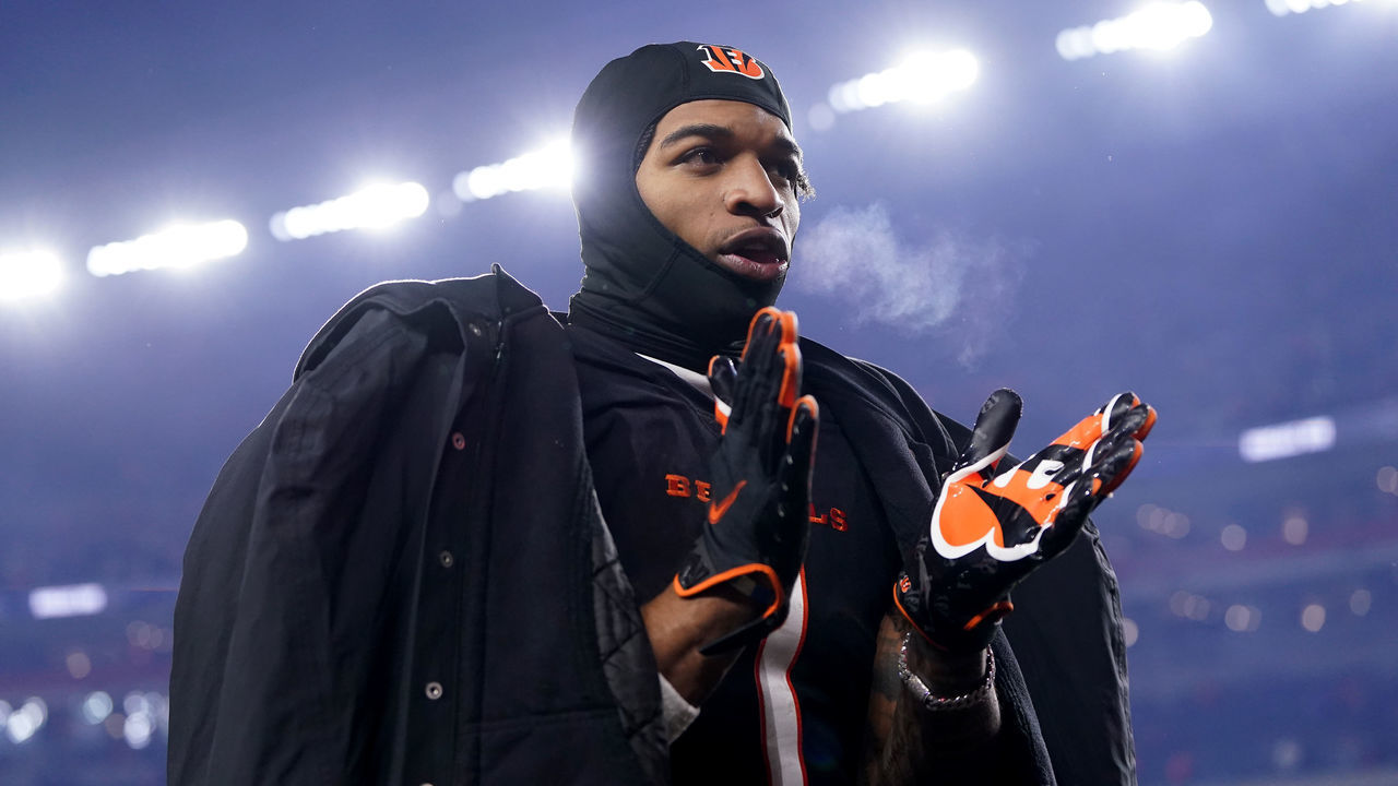 CINCINNATI, OHIO - JANUARY 15: Ja'Marr Chase #1 of the Cincinnati Bengals celebrates as he walks off the field after defeating the Baltimore Ravens in the AFC Wild Card playoff game at Paycor Stadium on January 15, 2023 in Cincinnati, Ohio. The Cincinnati Bengals defeated the Baltimore Ravens with a score of 24 to 17.